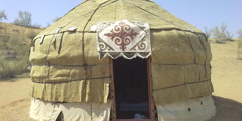 yurt and tipi in a natural setting