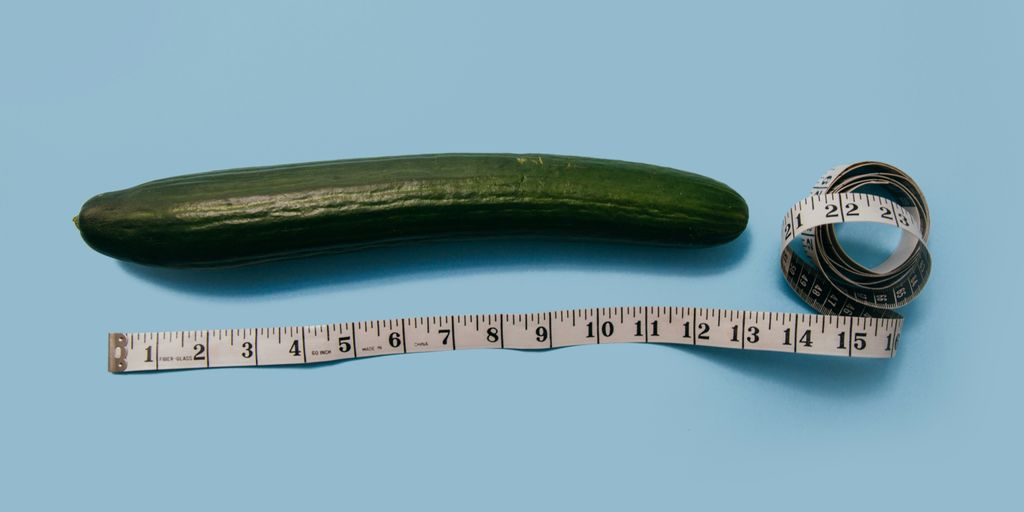 gourd and white tape measure on blue surface